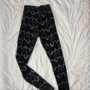 Never worn!Laser cut lace leggings+Gold Zipper